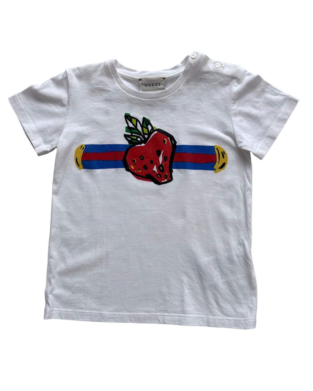 White t-shirt with a colorful graphic design, a strawberry,  on a white background